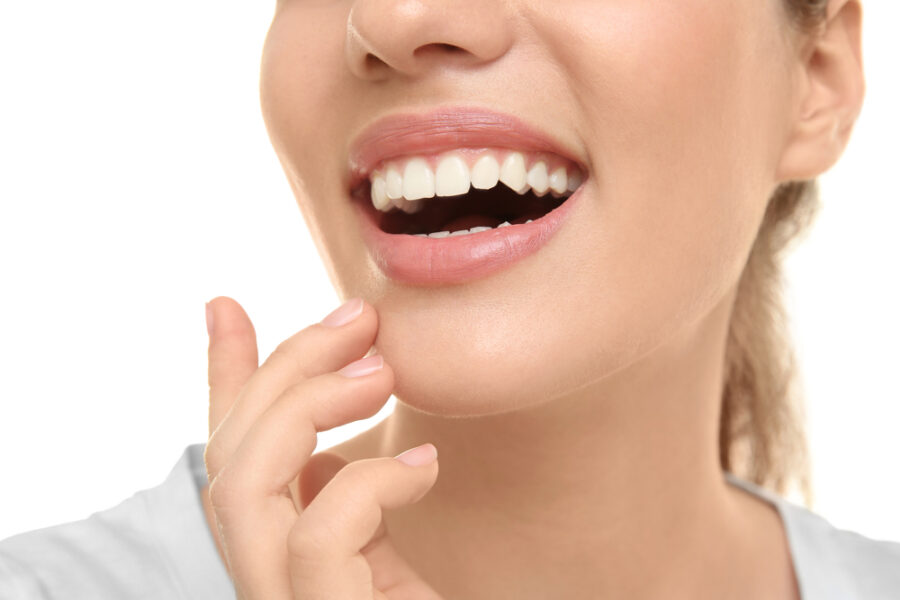 Close-up image of a confident smile showcasing strong, natural-looking teeth supported by dental implants, designed to restore function, stability, and long-term oral health – dental implants