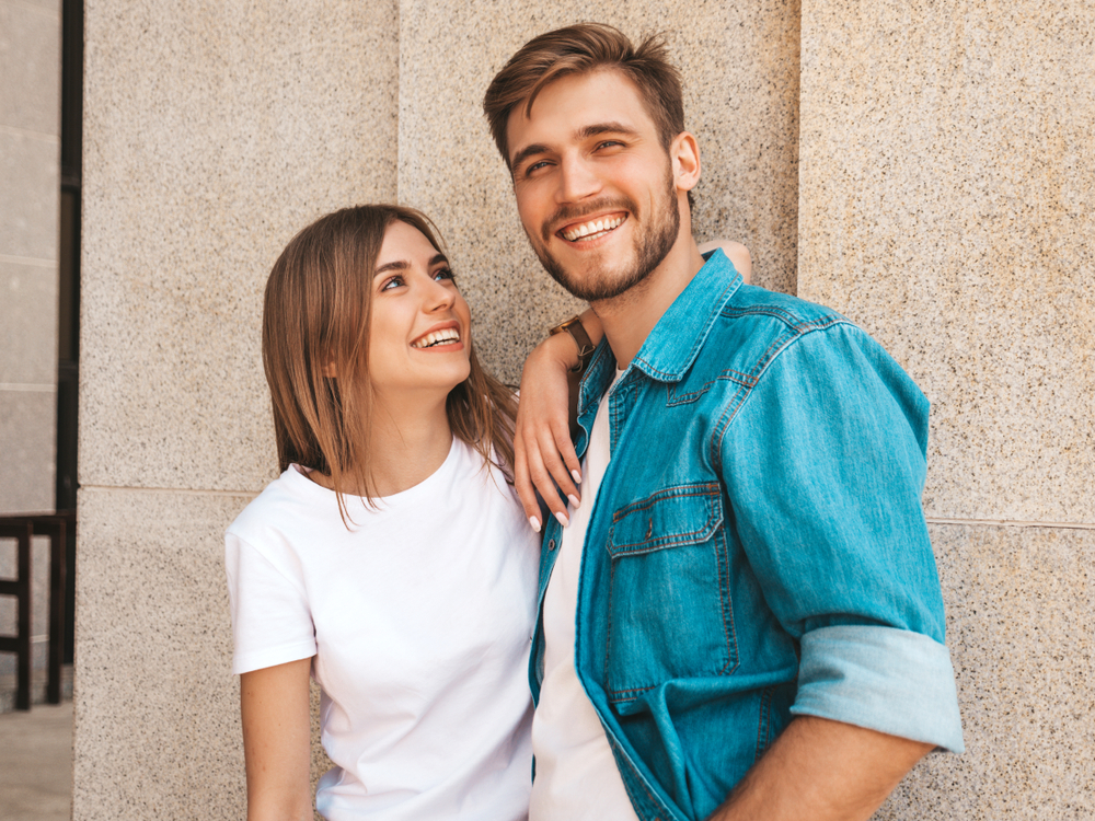 Bright Smiles After Teeth Whitening – Teeth Whitening Lake Forest CA Happy couple with bright white smiles enjoying the results of professional teeth whitening – Teeth Whitening Lake Forest CA